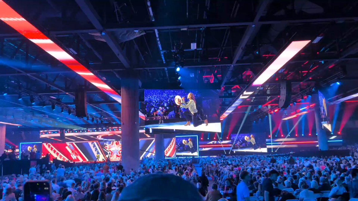 AmFest 2025: Russell Brand’s Prayer Offers Contrast to Event’s Infighting
